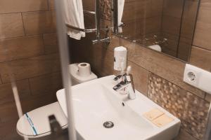 Koupelna v ubytování Sofia Hotel