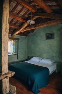 Postel nebo postele na pokoji v ubytování Arbalovija Rustic Villa