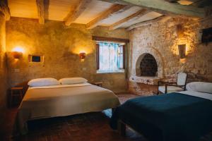 Postel nebo postele na pokoji v ubytování Arbalovija Rustic Villa