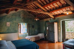 Postel nebo postele na pokoji v ubytování Arbalovija Rustic Villa