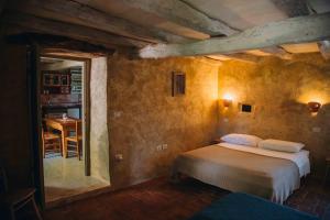Postel nebo postele na pokoji v ubytování Arbalovija Rustic Villa