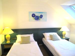 Postel nebo postele na pokoji v ubytování Penzion Pod Černou věží