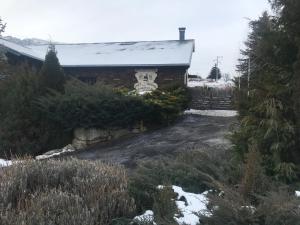 a house with a skull sign on the side of it at Lyshytta in Saint-Pierre-dels-Forcats