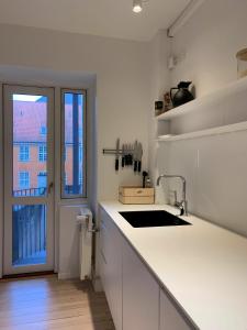 Køkken eller tekøkken på ApartmentInCopenhagen Apartment 1423