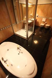 Baðherbergi á Hotel Borgo Don Chisciotte
