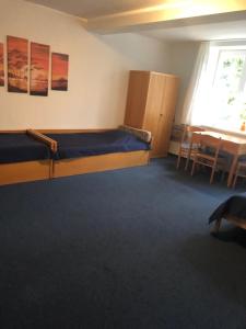 Ein Bett oder Betten in einem Zimmer der Unterkunft VITA Ferienresidenz