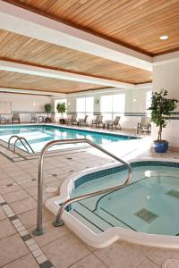 The swimming pool at or close to Country Inn & Suites by Radisson, Calgary-Northeast