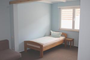 Krevet ili kreveti u jedinici u okviru objekta Hotel Garni Pension Ruth