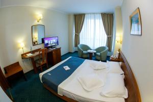 Cama o camas de una habitación en Unirea Hotel & Spa