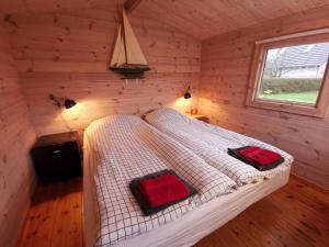 Letto o letti in una camera di Limfjords hytter