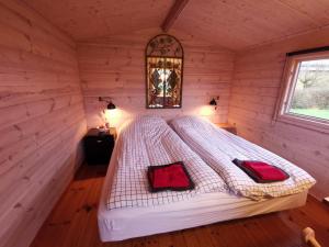 Letto o letti in una camera di Limfjords hytter