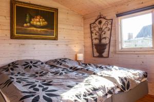 Letto o letti in una camera di Limfjords hytter