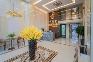 Lobi atau kawasan kaunter penerimaan di Maris Da Nang Hotel & Apartment