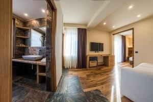 TV a/nebo společenská místnost v ubytování Hotel Firenze