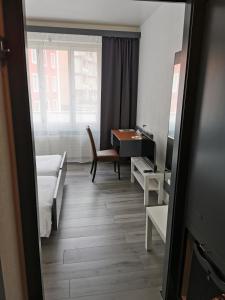 Voodi või voodid majutusasutuse Hotel Fleur-de-Lys toas