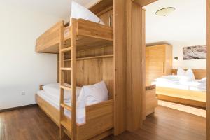 Postel nebo postele na pokoji v ubytování Aparthotel Hohe Brücke