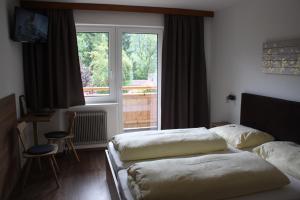 Posteľ alebo postele v izbe v ubytovaní Ferienhaus Penz