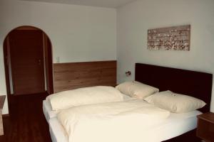 Posteľ alebo postele v izbe v ubytovaní Ferienhaus Penz