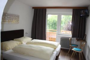Postel nebo postele na pokoji v ubytování Ferienhaus Penz