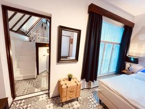 Aris Amsterdam客房内的一张或多张床位