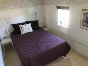 Postel nebo postele na pokoji v ubytování Nice holiday house at horse farm with lake and sauna