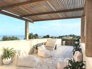 Posezení v ubytování Casa Peregrino Holbox
