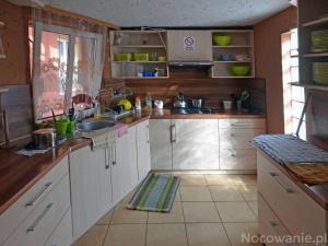 Kuchyň nebo kuchyňský kout v ubytování siodemka