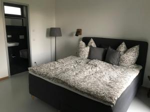 Postel nebo postele na pokoji v ubytování Gästehaus Lausnitz Zimmer