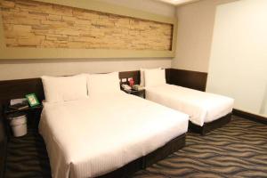 Letto o letti in una camera di Hotel 6 - Ximen