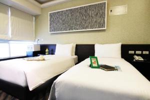 Letto o letti in una camera di Hotel 6 - Ximen