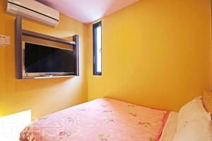 Postel nebo postele na pokoji v ubytování Sun Moon Lake Tan Hsiang Yu B&B