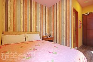 Postel nebo postele na pokoji v ubytování Sun Moon Lake Tan Hsiang Yu B&B
