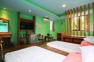 Postel nebo postele na pokoji v ubytování Sun Moon Lake Tan Hsiang Yu B&B