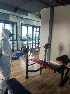 a person in a gym with some equipment at Interpark Hotel & Residence, Eastern Seaboard Rayong in Ban Phan Sadet Nok