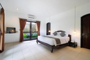 Singgah Villas Seminyak客房内的一张或多张床位
