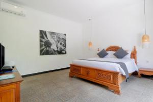 Singgah Villas Seminyak客房内的一张或多张床位
