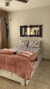 Ліжко або ліжка в номері casa lomas de mazatlan
