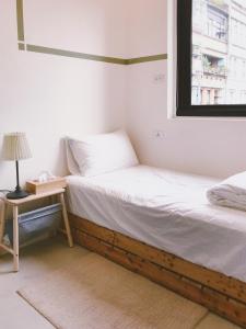 Cama o camas de una habitación en PlainStay Hostel