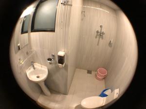 Koupelna v ubytování Hotel Satyam
