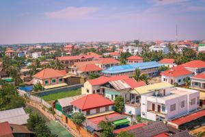an aerial view of a town with houses at Cheathata CTA Hotel Siem Reap in Siem Reap