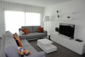 En sittgrupp på Villa das Hortas: new & modern villa @ Silvercoast - Portugal