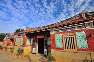 a red building with akritkritkrit at Feng Mao Lin Zhi in Jincheng