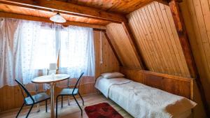 Posteľ alebo postele v izbe v ubytovaní Nova Mazury