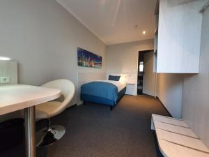Postel nebo postele na pokoji v ubytování Trend Hotel
