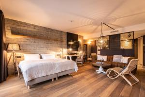 Postel nebo postele na pokoji v ubytování PAPA RHEIN - Hotel & Spa
