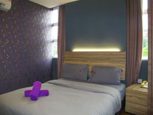 Postel nebo postele na pokoji v ubytování Classical Boutique Hotel