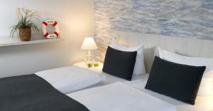 Postel nebo postele na pokoji v ubytování Trend Hotel