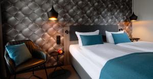 Postel nebo postele na pokoji v ubytování Trend Hotel