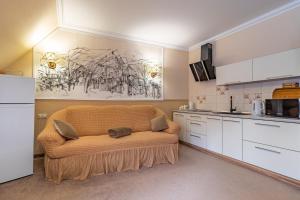 Kuchyň nebo kuchyňský kout v ubytování Petros Hotel