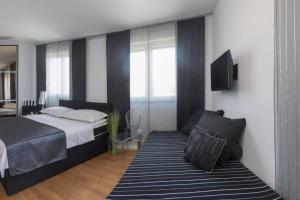 Posteľ alebo postele v izbe v ubytovaní Ensidia Luxury Suite